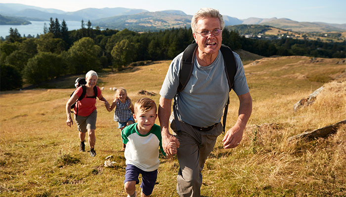 grandparents hiking with their grandchildren will you have enough to retire