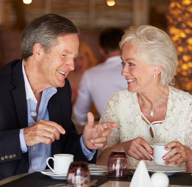 retirees enjoying couple of tea at an upscale restaurant educational seminars